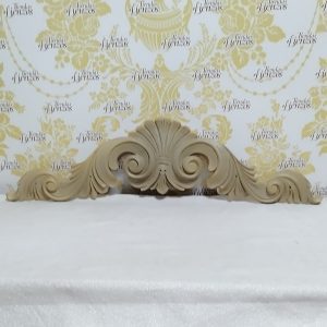 Capitel , 75 por 18 , resina